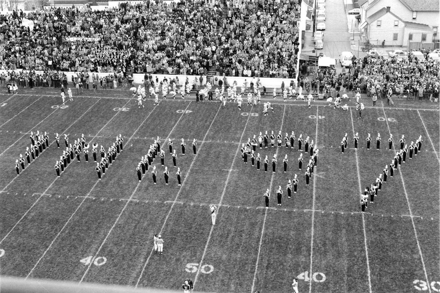 The Marching 97 spells out 'THE 97'