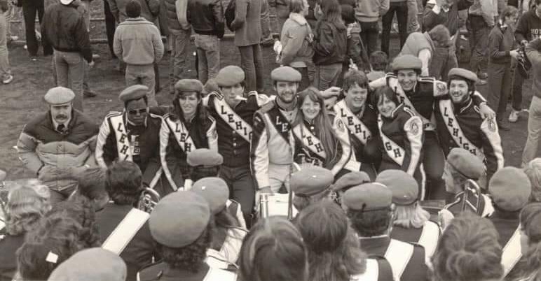The 1982 Executive Board smiling with their arms around each other