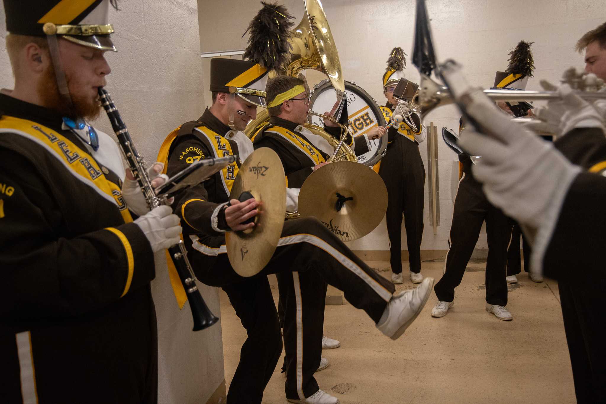 The band playing 'Throne Room', with a cymbal player crashing his cymbals underneath his leg