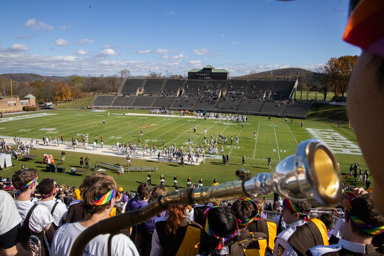 A view of the football field from the perspective of a sousaphonist high up in the stands