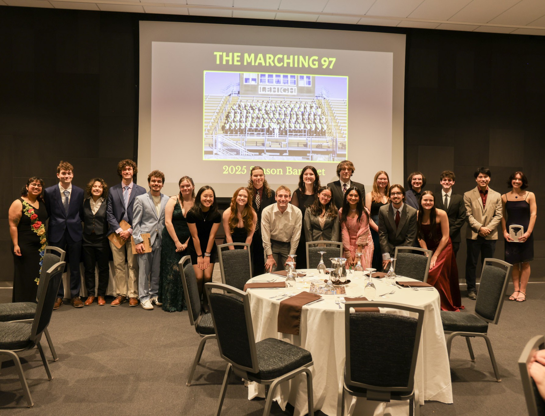 The new and old Executive Board smiling together at the band banquet