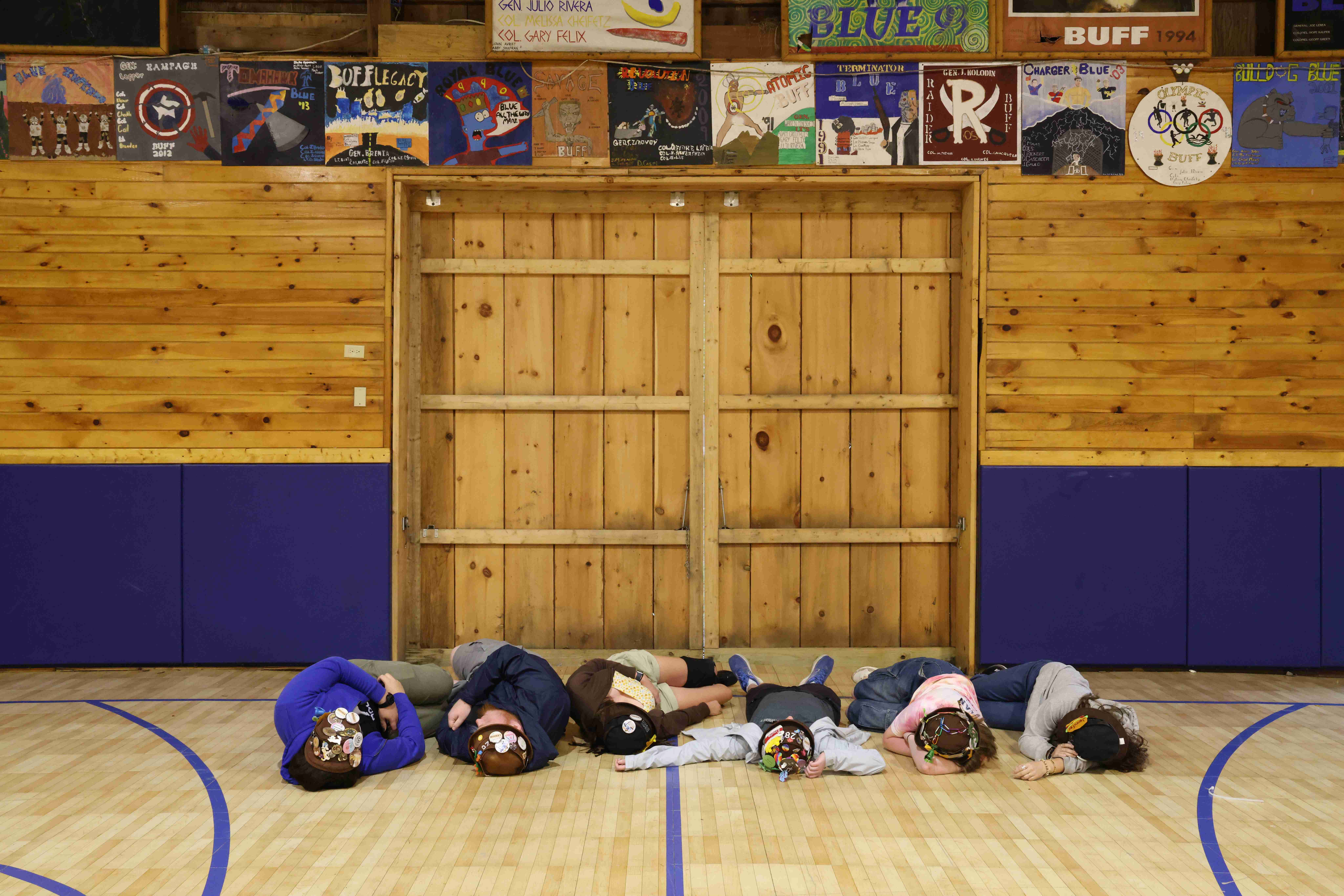 Rank 13 lying on the floor, pretending to sleep.